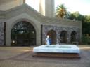 johannesburg-temple-march-2009-mary-at-fountain-with-front-door.JPG
