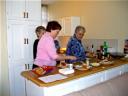 01-march-2010-fhe-durban-sisters-mickelsen-cox-and-mary-getting-food.JPG