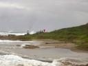 march-2010-couples-conference-pumula-beach-runners-going-over-the-hill.JPG