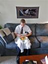 15jan13-ll-elder-taylor-eating-on-couch.jpg