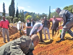 April 2014 - Tlotleng Funeral - Filling grave elders