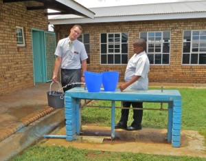 feb15 - Taylor, Magapi filling buckets